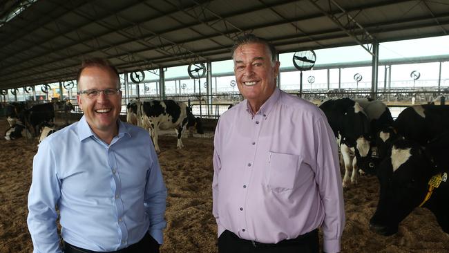 Western Sydney businessman Tony Perich (right) and Rory Macleod at their dairy.