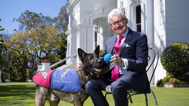 Queensland Governor Paul De Jersey with Gavel, the house dog. Picture: David Kelly