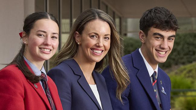 Sarah Higgins, 16 with Principal, Lauren Brooks, and Max Barilla, 17, outside the Andrea Pozzo Centre at St Ignatius College in Athelstone, where the school has brought in $171.4m over five years, Wednesday, June 26, 2024. Picture: Matt Loxton