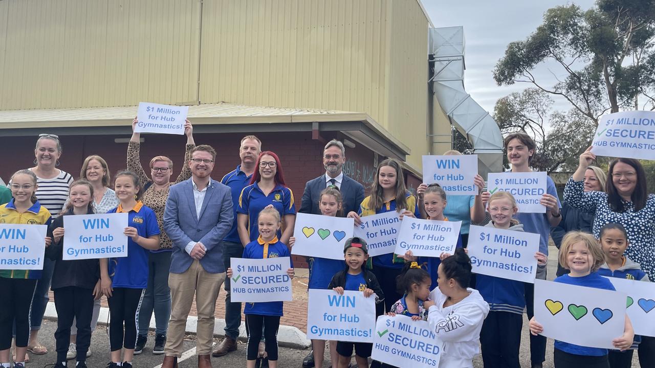 Members of the Hub Gymnastics celebrate the $1m funding boost from the federal government with Simon McMahon, Emma Murray and Senator Andrew McLachlan CSC. Picture: Emily Jarvis