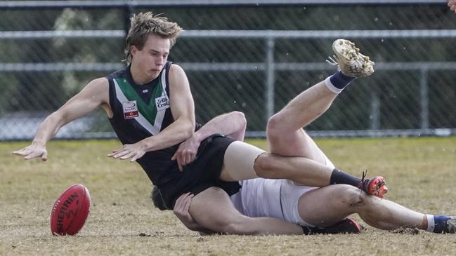 EFL: Donvale’s Harrison Ablett gets taken down. Picture: Valeriu Campan