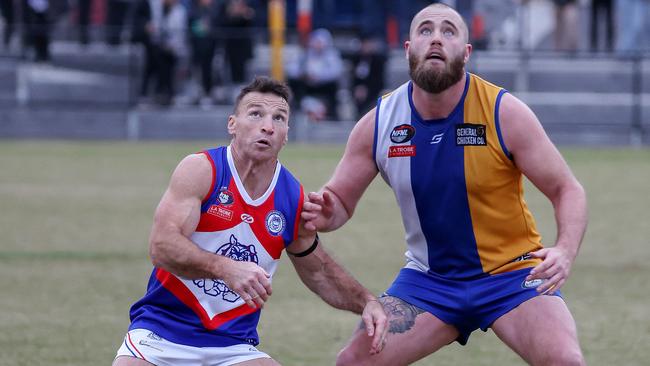 NFL footy: Macleod v North Heidelberg at De Winton Park, Rosanna, June 11th. Brent Harvey for North Heidelberg rucks against number 27 for Macleod.Picture : George Salpigtidis