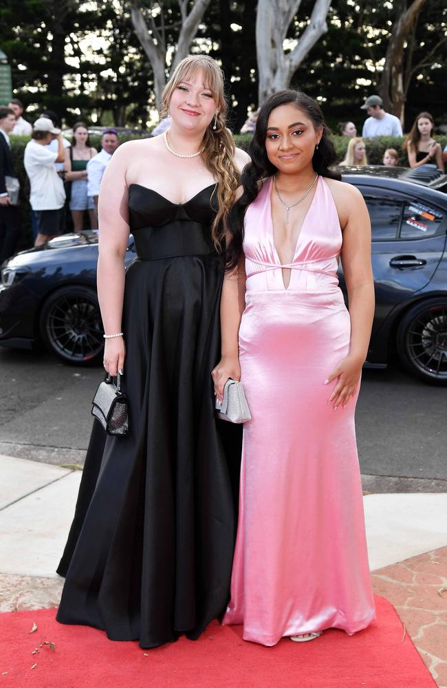 Ebony Sullivan and Aleysha Falemahu at Centenary Heights State High School formal. Picture; Patrick Woods.