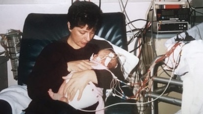 Ms Folbigg with Laura, the child she lost at 19 months.