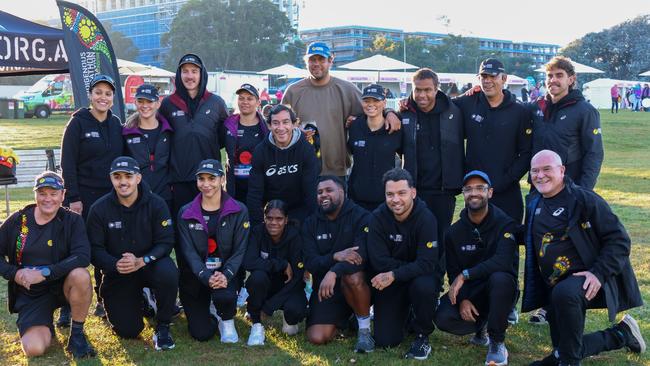 Sharman Williams (front row, third from left) is pictured with the rest of the Indigenous Marathon Project team for 2025, alongside AFL legend Buddy Franklin and NRL legend Johnathan Thurston. Picture: Korey Summers