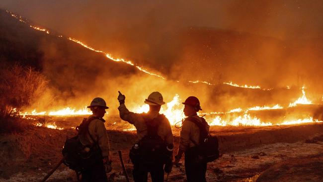 Fire crews battle the Kenneth Fire in the West Hills section of Los Angeles. Picture: AP