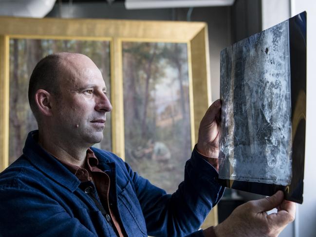 NGV's head of conservation Michael Varcoe-Cocks has made a new discovery about Frederick McCubbin's "The Pioneer". Picture: Eugene Hyland