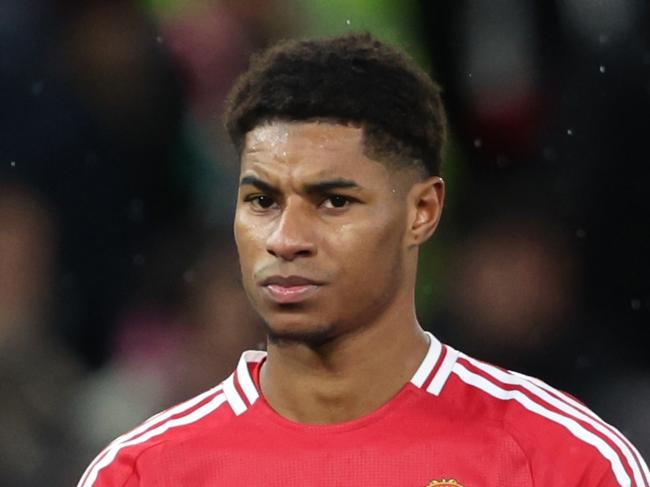 MANCHESTER, ENGLAND - DECEMBER 07: Marcus Rashford of Manchester United applauds the fans as he looks dejected after defeat to Nottingham Forest during the Premier League match between Manchester United FC and Nottingham Forest FC at Old Trafford on December 07, 2024 in Manchester, England. (Photo by Clive Brunskill/Getty Images)