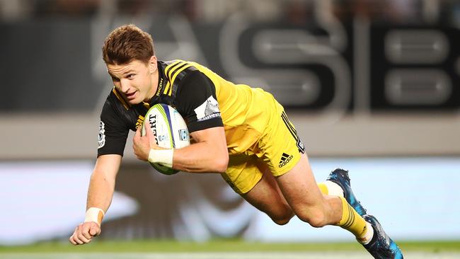 Beauden Barrett of the Hurricanes dives over for a try at Eden Park.