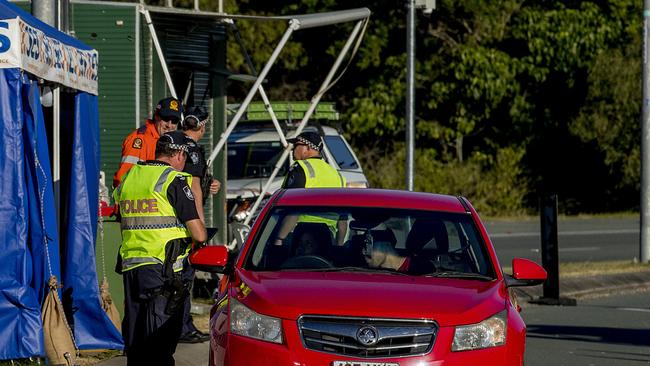 Police at the Queensland border from NSW to QLD, inspecting cars due to COVID-19. Gold Coast Highway border patrol in Bilinga. Picture: Jerad Williams