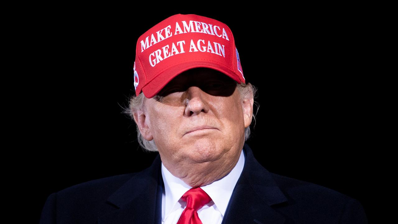 US President Donald Trump arrives for a Make America Great Again rally at Hickory Regional Airport in North Carolina on November 1, 2020. Picture: Brendan Smialowski/AFP.