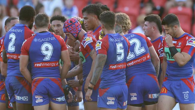 Knights players look dejected during the round eight loss. Photo by Ashley Feder/Getty Images.