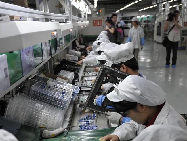 Workers at Foxconn’s Shenzhen factory pictured in 2010. Picture: AFP