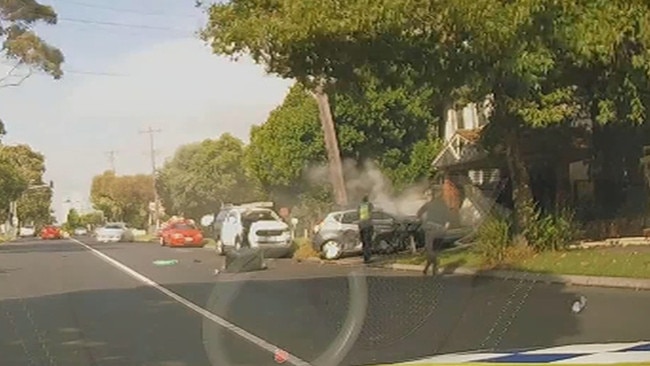 Police had their guns drawn after Abdirahman Basa crashed the stolen car into a power pole following a wild pursuit across Melbourne's west. Picture: Supplied.