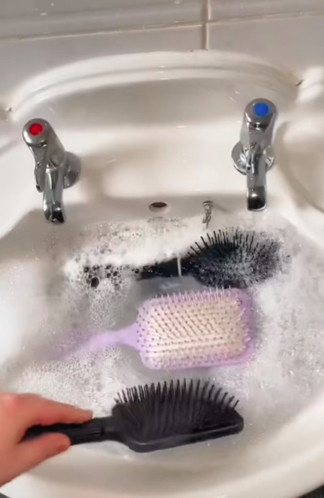 A TikTok creator wanted to see if her innocuous looking hairbrushes could be harbouring some serious grime. Picture: TikTok