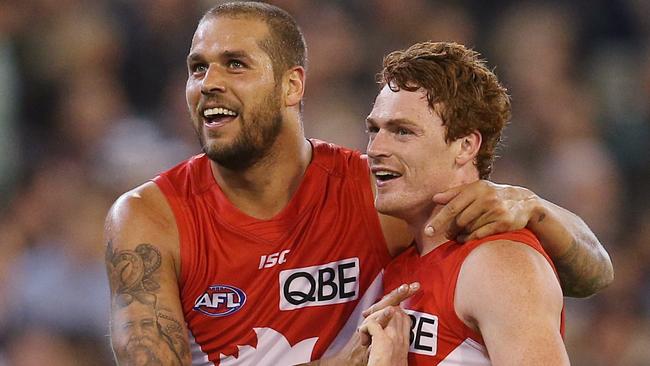 Lance Franklin celebrates a second quarter goal with Gary Rohan. Picture: Michael Klein