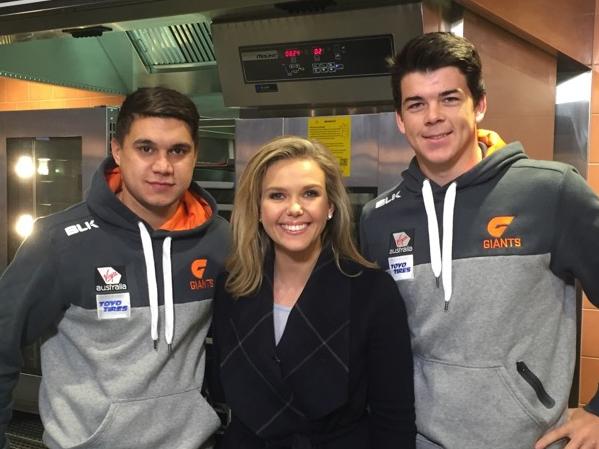 Sunrise weather presenter Edwina Bartholomew with Giants players Jarrod Pickett and Matthew Kennedy for DoSomething Day campaign at St John's Park Bowling Club.