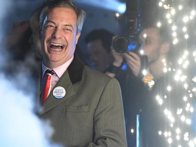 Brexit Party leader Nigel Farage smiles on stage in parliament Square. Picture: AFP