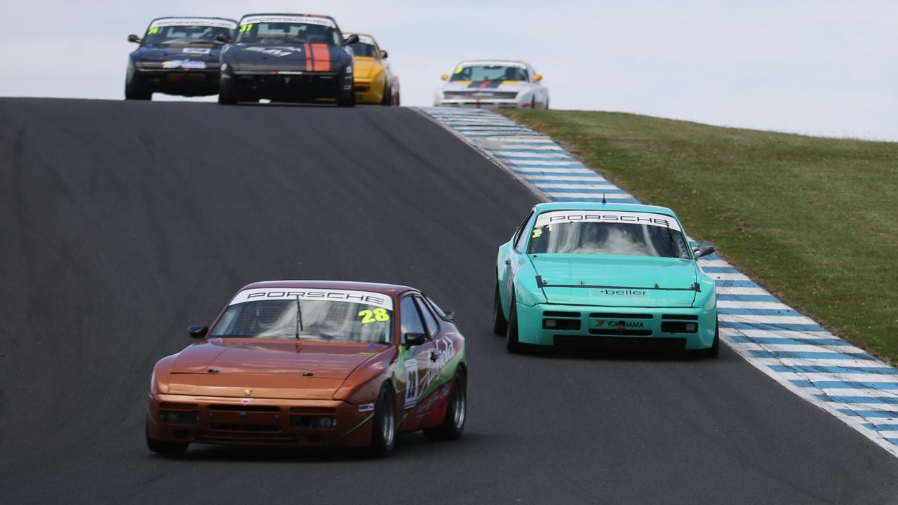 James Westaway and Cameron Beller lead a pack of the Porsche 944 Challenge racers. Image: Revved Photography.