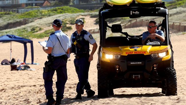 Northern Beaches Police have established a crime scene on North Narrabeen Beach as part of investigations into how a spearfisher died on Monday afternoon. Picture: Toby Zerna