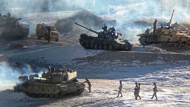 People Liberation Army soldiers and tanks during military disengagement. Picture: AFP