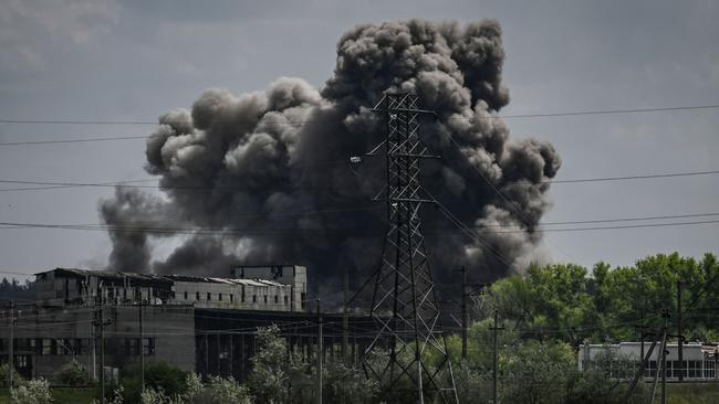 Smoke rises after a strike on a factory in the eastern Ukrainian city. Picture: AFP