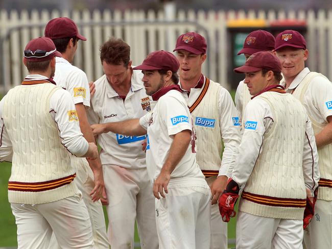 Cricket, Sheffield Shield Tasmanian Tigers versus Queensland Bulls (Qld) at Blundstone Arena (Bellerive Oval), Bull's bowler Matthew Gale celebrates with teammates after taking the wicket of Tasmanian batsman George Bailey