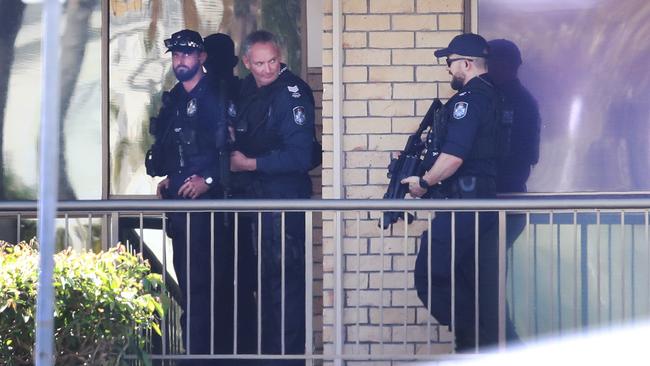 Armed police officers at the scene. Picture: Glenn Hampson.