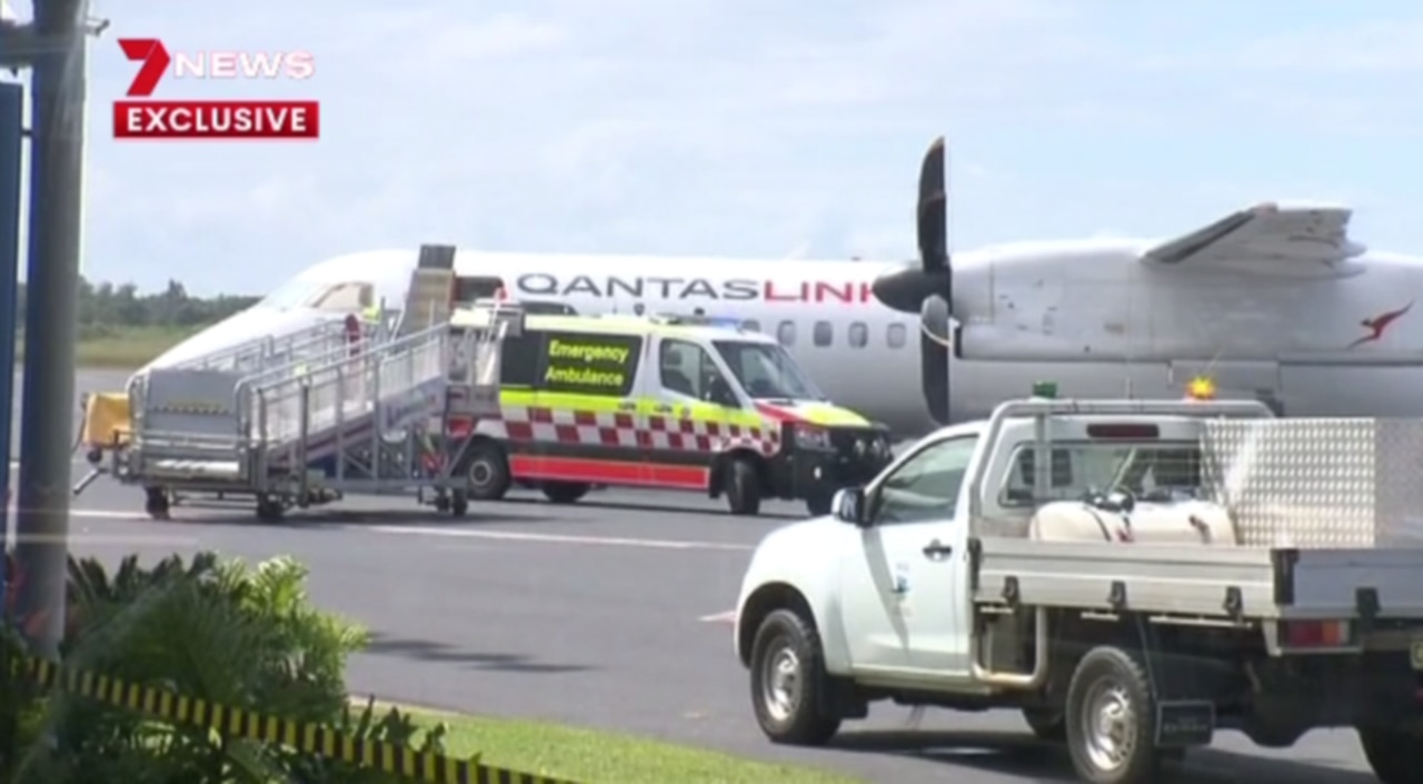 An ambulance awaits the Qantaslink flight.