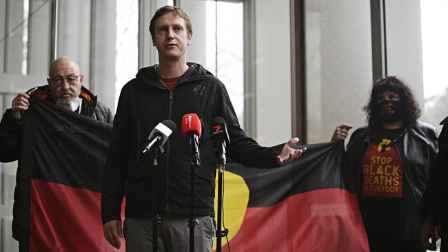 Black Lives Matter protest organiser Padraic Gibson speaks outside yhe Supreme Court in Sydney. Picture: Adam Yip