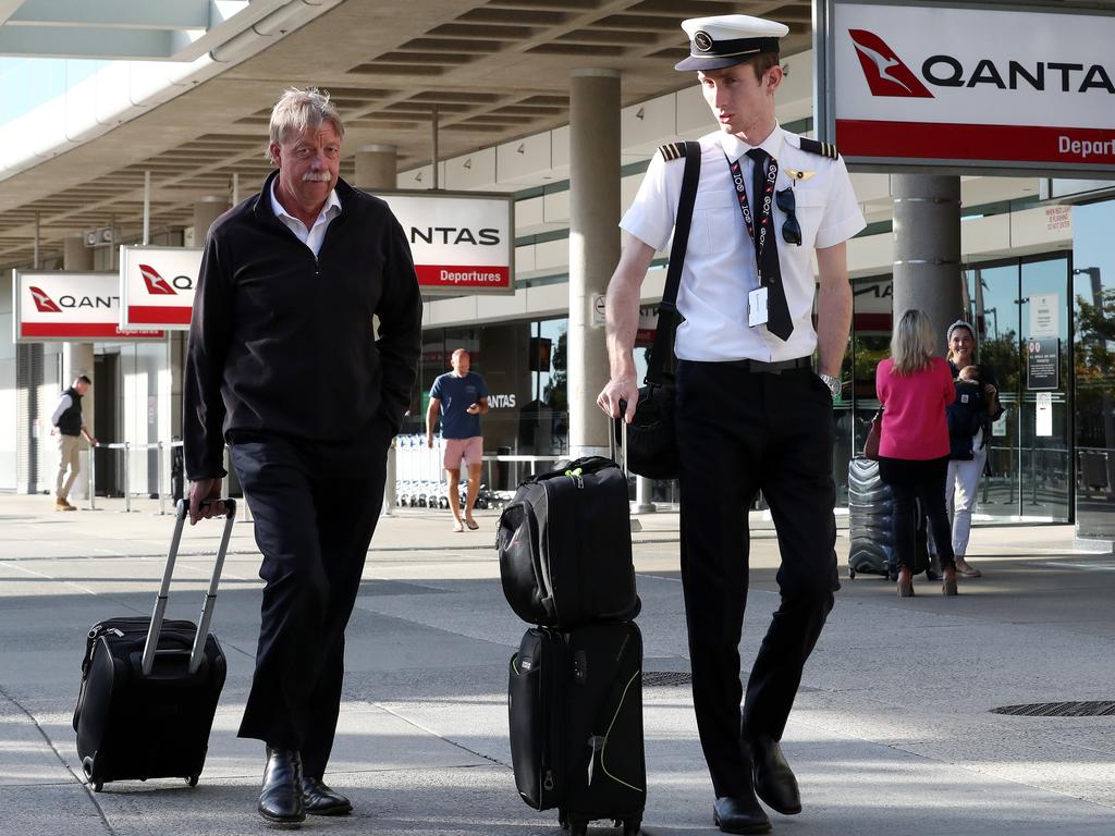 Qantas staff at Brisbane airport. Picture: Liam Kidston