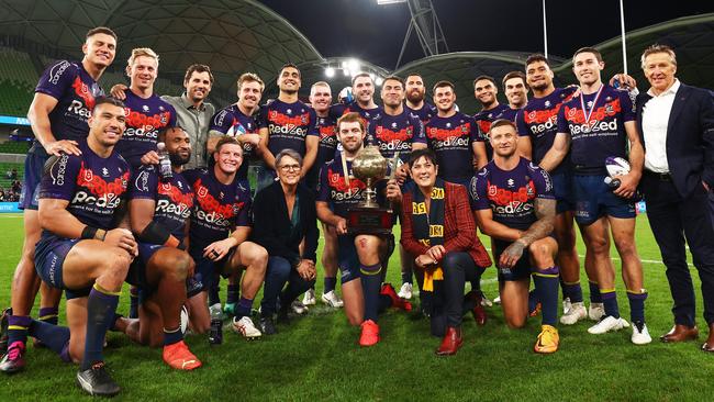 MELBOURNE, AUSTRALIA - APRIL 25: The Storm pose with the Michael Moore Trophy following victory in the round eight NRL match between Melbourne Storm and New Zealand Warriors at AAMI Park on April 25, 2023 in Melbourne, Australia. (Photo by Graham Denholm/Getty Images)