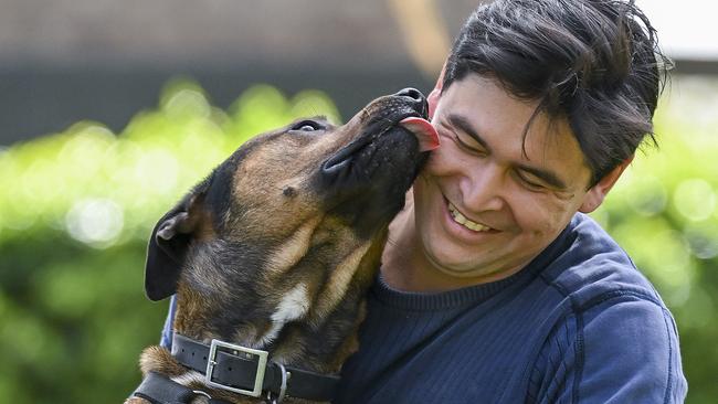 Michael Fiergert and his Staffie Cross Mastiff "Wally" play in a park at bellevue Heights Monday,September,4,2023.Picture Mark Brake