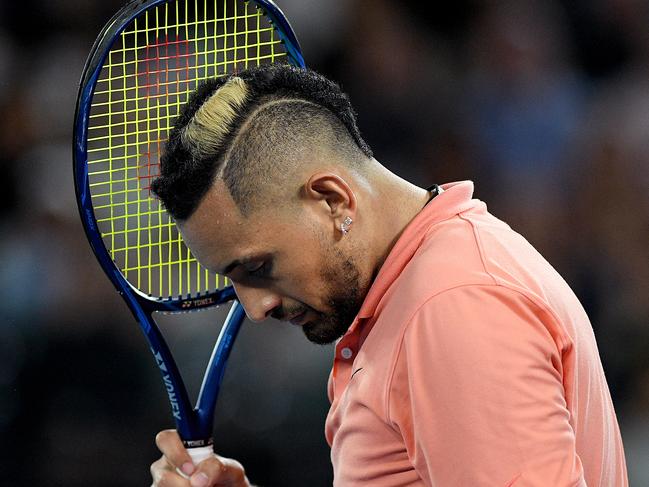 Nick Kyrgios of Australia reacts after losing his fourth round match against Rafael Nadal of Spain on day eight of the Australian Open tennis tournament at Rod Laver Arena in Melbourne, Monday, January 27, 2020. (AAP Image/Lukas Coch) NO ARCHIVING, EDITORIAL USE ONLY