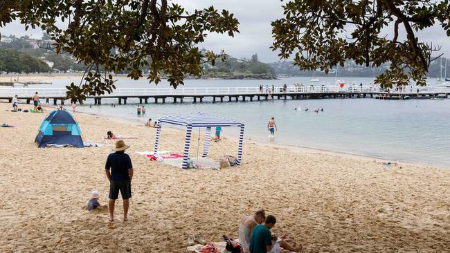 Balmoral Beach, with its large enclosed swim area, is a popular choice on hot days in Sydney. Picture: Max Mason-Hubers