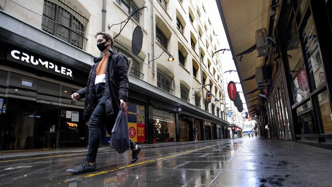 A man walks down a deserted Degraves Street during stage four Picture: NCA NewsWire / David Geraghty