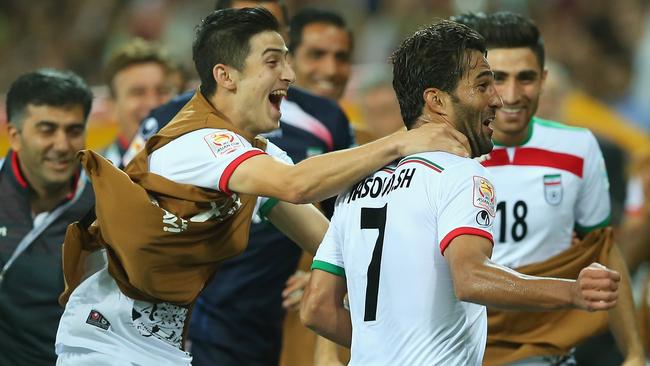 Iran can’t hide their joy after Masoud Shojaei’s goal against Bahrain at AAMI Park.