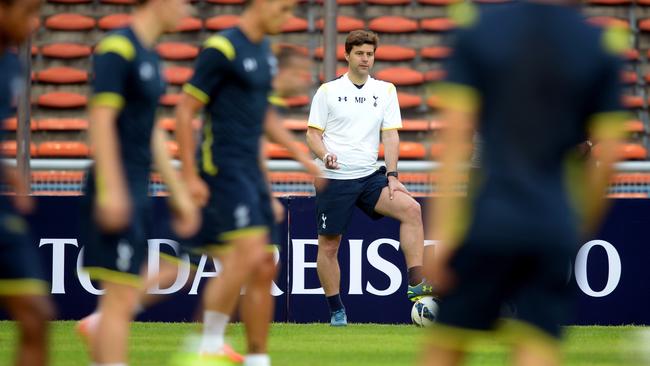 Tottenham Hotspur's Argentinian manager and head coach Mauricio Pochettino puts his squad through their paces during training in Malaysia.