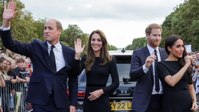 Meghan made a surprise appearance alongside her husband outside Windsor Castle. Picture: AFP