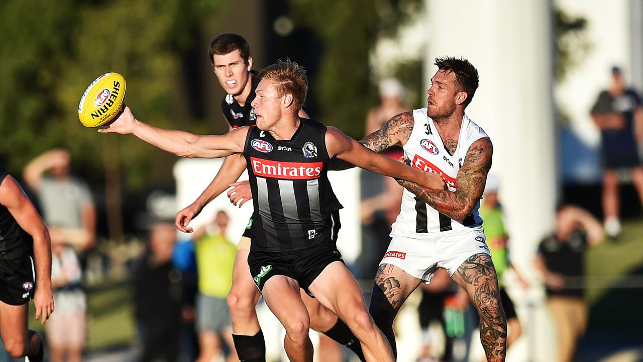 Jordan De Goey and Dane Swan go head-to-head in an intra-club in 2016. Picture: Nigel Hallett