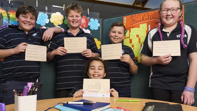 Eli Iversen, 10, Jake Kilgallon, 11, Ysabella Wright, 10, Orlando Wade, 10, and Claire Thomas, 11, at South Port Primary School in Port Noarlunga South, with postcards to the Commissioner. Picture: Matt Loxton