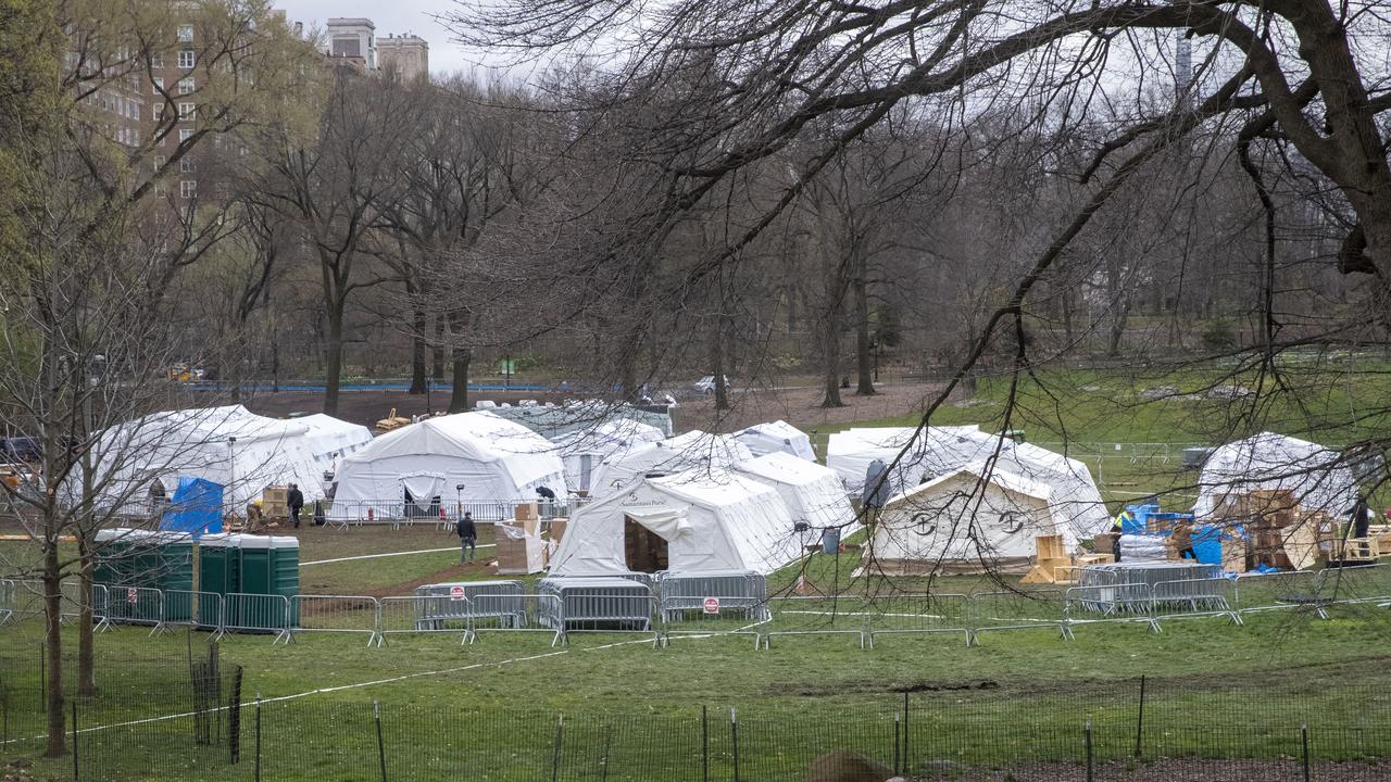 Samaritan's Purse crew and medical personnel preparing to open a 68-bed emergency field hospital specially equipped with a respiratory unit in New York's Central Park, Tuesday, March 31, 2020, in New York. Picture: Mary Altaffer