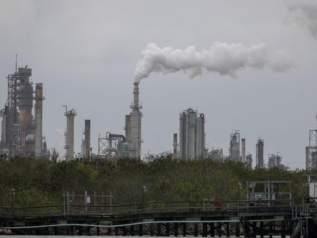 (FILES) In this file photo taken on March 11, 2019 a refinery near the Corpus Christi Ship Channel is pictured in Corpus Christi, Texas. - President Donald Trump announced on September 15, 2019 that he has authorized the release of oil from US strategic reserves after drone attacks cut Saudi Arabia's crude production by half. (Photo by Loren ELLIOTT / AFP)