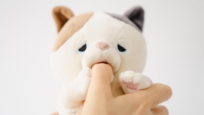 The Amagami Ham Ham is a cat-like robot on show at CES 2022 that nibbles users' fingers.