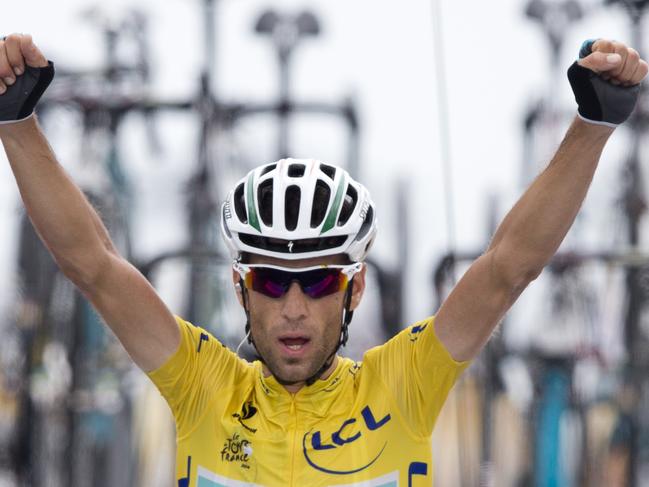 Italy's Vincenzo Nibali crosses the finish line to win the eighteenth stage of the Tour de France cycling race over 145.5 kilometers (90.4 miles) with start in Pau and finish in Hautacam, Pyrenees region, France, Thursday, July 24, 2014. (AP Photo/Peter Dejong)