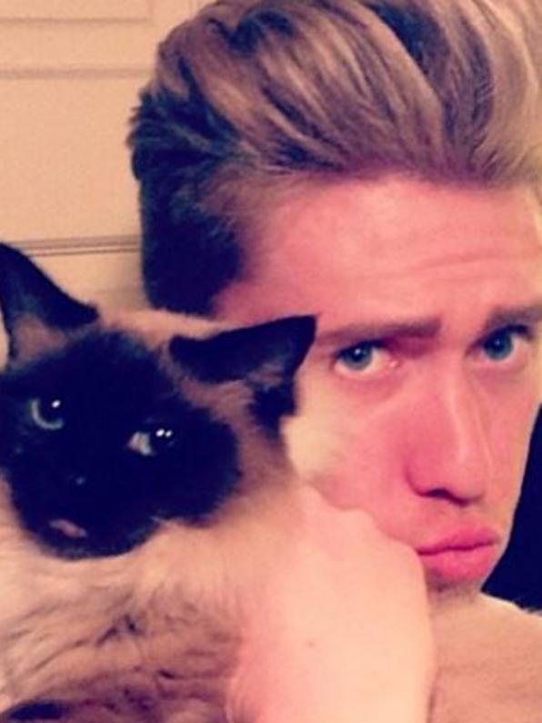 Hot men with cats on Instagram