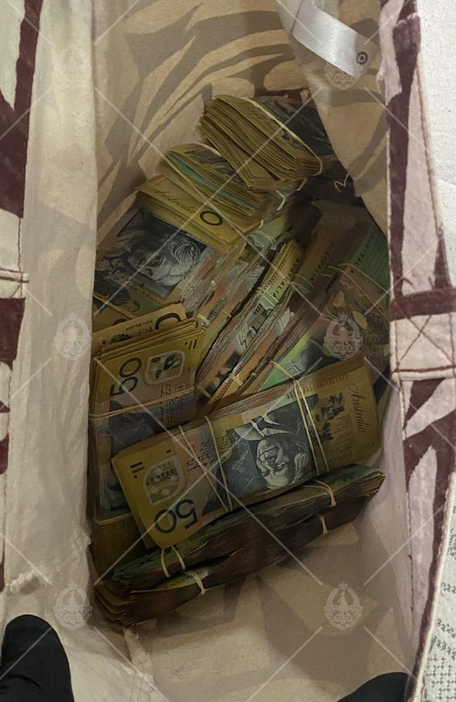 A Mongols bikie gang member has been arrested in Darwin following a major police operation that uncovered cash and drugs linked to an alleged trafficking operation. Picture: NT Police / Supplied.