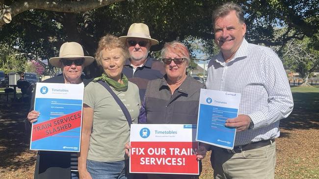 Regular train users with Member for Burnett Stephen Burnett, Geraldine Castleton, Cecily Fay and Elaine Kerr. Behind: Peter Castleton.