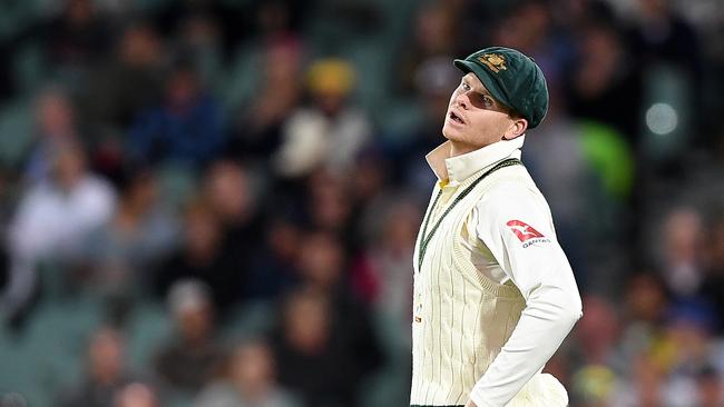 Australian captain Steve Smith reacts following a dropped catch.