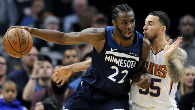 Phoenix Suns' Mike James (55) guards against Minnesota Timberwolves' Andrew Wiggins (22). (AP Photo/Hannah Foslien)